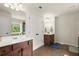 Bright bathroom with dual vanities and ample storage space at 3070 Jardin Nw Ln, Kennesaw, GA 30152