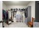 Walk-in closet with custom shelving for optimal storage and organization at 3070 Jardin Nw Ln, Kennesaw, GA 30152