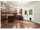 Well-appointed kitchen with stainless steel appliances, hardwood floors, and an island, offers convenience and style at 3070 Jardin Nw Ln, Kennesaw, GA 30152