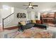 Spacious living room connects to kitchen, featuring comfortable seating and abundant natural light, ideal for gatherings at 3070 Jardin Nw Ln, Kennesaw, GA 30152