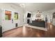 Inviting living room with a fireplace, large windows, and easy access to the outdoor patio, blending indoor/outdoor living at 3070 Jardin Nw Ln, Kennesaw, GA 30152