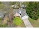 Charming home featuring a two-car garage, mature trees and attractive landscaping at 1545 Smoke Hill Dr, Hoschton, GA 30548