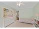 Neutral bedroom with an oversized dresser, shelving and ensuite bathroom access at 2023 Belridge Se Ct, Smyrna, GA 30080