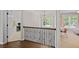 Upstairs landing featuring detailed banister, adjacent rooms, and chandelier at 2023 Belridge Se Ct, Smyrna, GA 30080