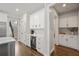 Gourmet kitchen featuring custom cabinetry, wine fridge, and seamless flow for elegant entertaining at 2023 Belridge Se Ct, Smyrna, GA 30080