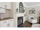 Cozy living room with fireplace, built-in cabinets, and stylish decor for comfortable living at 2023 Belridge Se Ct, Smyrna, GA 30080