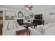 Inviting living room featuring a fireplace, built-in cabinets, and comfortable seating at 2023 Belridge Se Ct, Smyrna, GA 30080