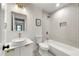 This bright bathroom features modern fixtures, a vessel sink, and a shower/tub combination at 2244 Alpha Dr, Decatur, GA 30032