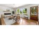 Bright living room featuring large windows, a modern fireplace, and hardwood floors at 2244 Alpha Dr, Decatur, GA 30032