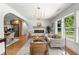 Spacious living room with hardwood floors, open to dining and kitchen areas at 2244 Alpha Dr, Decatur, GA 30032