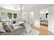 This bedroom has natural light and includes a peek into an en suite bathroom at 2244 Alpha Dr, Decatur, GA 30032
