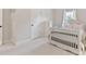 Clean, well-lit bedroom showcasing neutral tones and white carpet at 2307 Loughridge Dr, Buford, GA 30519
