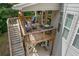 Exterior view of a multi-level deck and outdoor seating area, perfect for relaxation and entertainment at 2307 Loughridge Dr, Buford, GA 30519