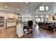 Gourmet kitchen with granite countertops, stainless steel appliances, and breakfast bar at 2910 Creek Tree Ln, Cumming, GA 30041