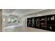 Spacious living area with hardwood floors, built-in shelves, and great natural lighting at 2910 Creek Tree Ln, Cumming, GA 30041