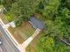Aerial view of the home with driveway and mature trees at 8535 Hiram Acworth Hwy, Dallas, GA 30157