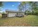 The backyard with a deck and a large grassy area at 8535 Hiram Acworth Hwy, Dallas, GA 30157