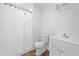 Bathroom featuring shower with white curtain, updated vanity, sink, and lighting at 8535 Hiram Acworth Hwy, Dallas, GA 30157