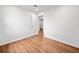 Bright bedroom featuring wood-look flooring and a neutral color scheme at 8535 Hiram Acworth Hwy, Dallas, GA 30157