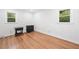 Bedroom with wood flooring and two windows providing natural light at 8535 Hiram Acworth Hwy, Dallas, GA 30157
