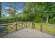 Wooden deck area overlooking a private, green backyard at 8535 Hiram Acworth Hwy, Dallas, GA 30157