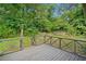 Wooden deck area overlooking a private, green backyard at 8535 Hiram Acworth Hwy, Dallas, GA 30157
