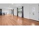Bright and open living room featuring beautiful hard wood floors, plenty of natural light, and a stylish front door at 8535 Hiram Acworth Hwy, Dallas, GA 30157