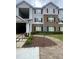 Attractive multi-story building featuring neutral siding and brick accents at 14104 Fairington Circle Ridge, Stonecrest, GA 30038