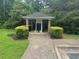 Community mail kiosk surrounded by landscaping at 14104 Fairington Circle Ridge, Stonecrest, GA 30038