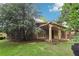 Well-maintained home features a covered patio and mature trees at 3405 Glenrose Trail Trl, Atlanta, GA 30341