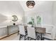 Cozy dining room features modern lighting and views to the outdoors at 3405 Glenrose Trail Trl, Atlanta, GA 30341