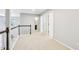 Bright hallway with neutral carpet features easy access to several bedrooms and bathrooms at 3405 Glenrose Trail Trl, Atlanta, GA 30341