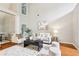 Airy living room has high ceilings and features plenty of natural light at 3405 Glenrose Trail Trl, Atlanta, GA 30341