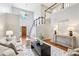 Spacious living room with high ceilings, hardwood floors, and an open staircase at 3405 Glenrose Trail Trl, Atlanta, GA 30341