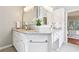 Main bathroom with double sinks, granite counters, and modern fixtures at 3405 Glenrose Trail Trl, Atlanta, GA 30341