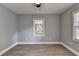 Bedroom with a single window, wood-look floors and neutral-colored walls at 737 Bolton Nw Rd, Atlanta, GA 30331
