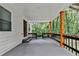 Inviting covered front porch with stained wood posts, providing a welcoming entry and outdoor space at 737 Bolton Nw Rd, Atlanta, GA 30331