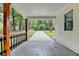 Spacious covered porch, ideal for relaxing and enjoying views of the surrounding landscape at 737 Bolton Nw Rd, Atlanta, GA 30331