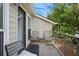 Relaxing balcony with seating, overlooking green space with ample natural light at 3210 Lake Pointe Cir, Roswell, GA 30075