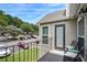 Cozy balcony with seating area, perfect for relaxing and enjoying the views of the community at 3210 Lake Pointe Cir, Roswell, GA 30075