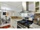 Renovated kitchen featuring stainless steel appliances and granite countertops at 3210 Lake Pointe Cir, Roswell, GA 30075