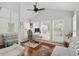 Well-lit office featuring cherrywood floors, vaulted ceilings, and large windows with plantation shutters at 3210 Lake Pointe Cir, Roswell, GA 30075