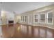 Spacious living room boasts hardwood floors, a fireplace, and plenty of natural light at 1254 Williston Dr, Lawrenceville, GA 30044