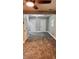Finished basement with two white doors, a ceiling fan, carpeting, and a neutral color scheme at 2443 Abner Nw Pl, Atlanta, GA 30318