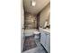 Stylish bathroom features modern vanity, toilet, tub, and tiled walls, enhancing the home's appeal at 2443 Abner Nw Pl, Atlanta, GA 30318