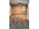 Carpeted bedroom with neutral walls and windows creating a warm, inviting space at 2443 Abner Nw Pl, Atlanta, GA 30318