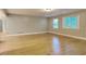Bright living room featuring hardwood floors, natural light, and neutral walls at 247 Millbrook Farm Rd, Marietta, GA 30068
