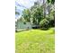 Expansive backyard featuring a deck with an umbrella, perfect for outdoor relaxation and entertaining guests at 3544 Citrus Dr, Duluth, GA 30096