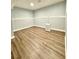 Spacious basement area with new flooring and fresh paint at 3544 Citrus Dr, Duluth, GA 30096