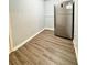Basement features new floors and a stainless steel refrigerator at 3544 Citrus Dr, Duluth, GA 30096